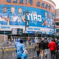 Fans walk into Ford Field before the Lions game